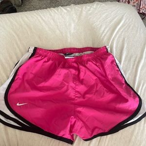 Pink Nike running shorts